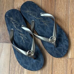 Michael Kors Black and Gold Flip Flops
